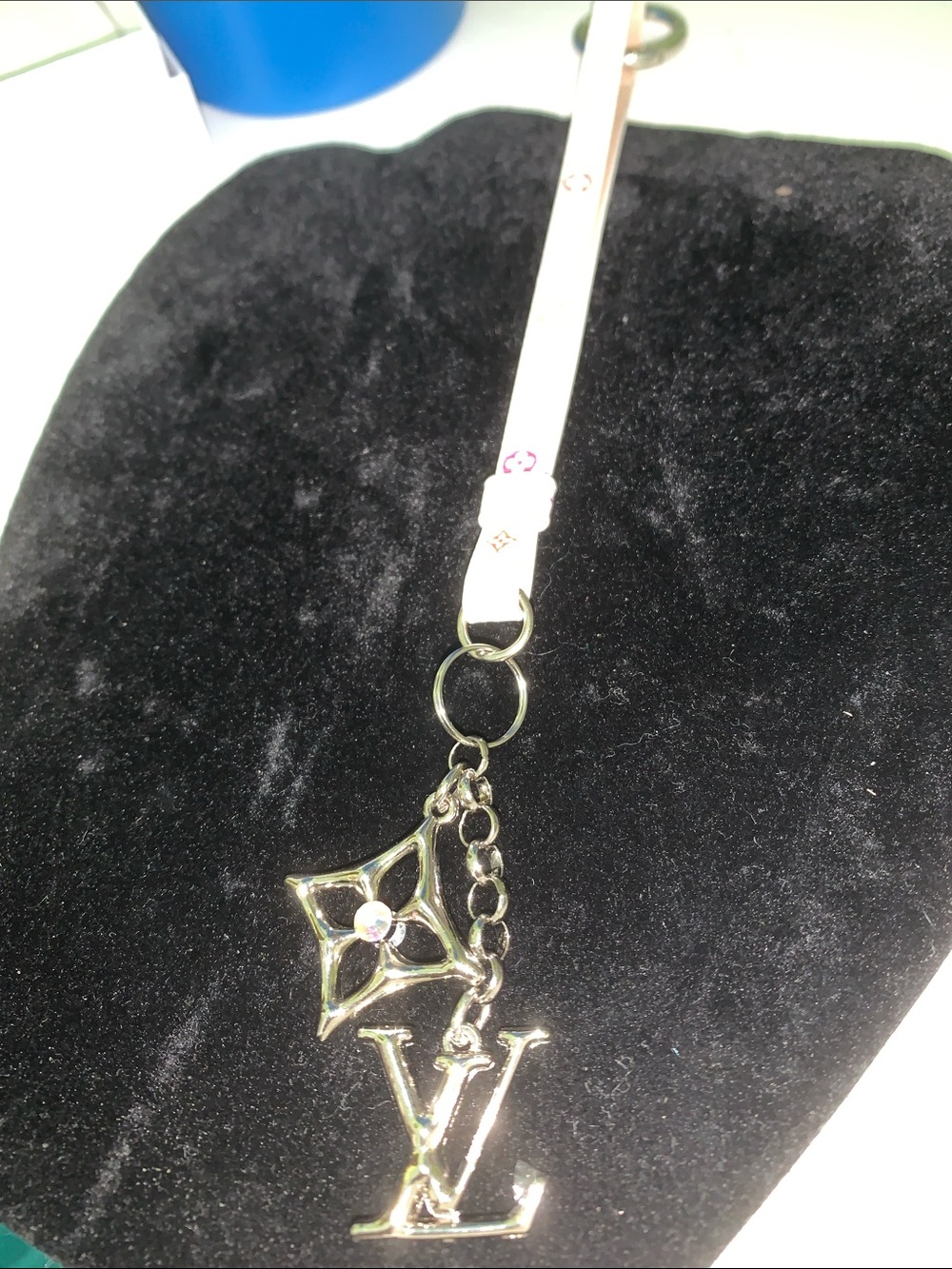 Upcycled White Leather Strap bag charm keychain with silver LV charm